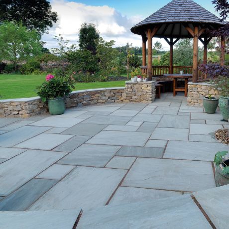 Light Grey Classic Sandstone Calibrated Paving Slabs Natural Paving Slabs Paving Direct Works well with flint and limestone brickwork properties but also complements red brickwork. pavestone calibrated classic sandstone in light grey
